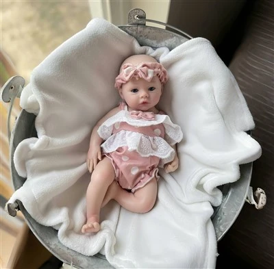 What is the best way to protect the paint on a Rare Reborn Baby Doll?
